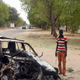 Local residents stand by the wreckage of a car that was blown up by suspected Boko Haram militants in Nigeria’s troubled northeastern city of Maiduguri on March 25, 2014, killing five police officers, while a separate blast killed three.
AFP/Getty Images